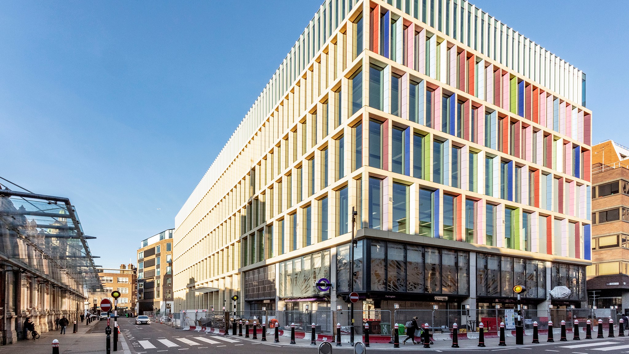 Philip Payne secures the exit signs for the Tik Tok HQ in London